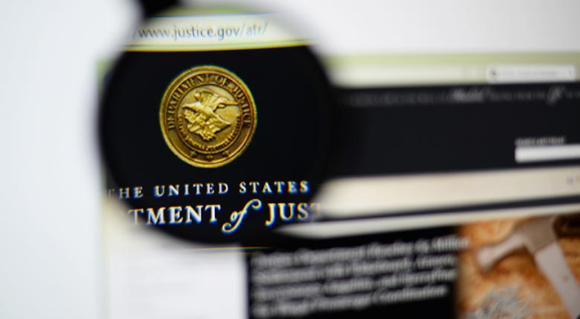 A browser window displaying the website of the U.S. Department of Justice with only a small portion of the website in focus.